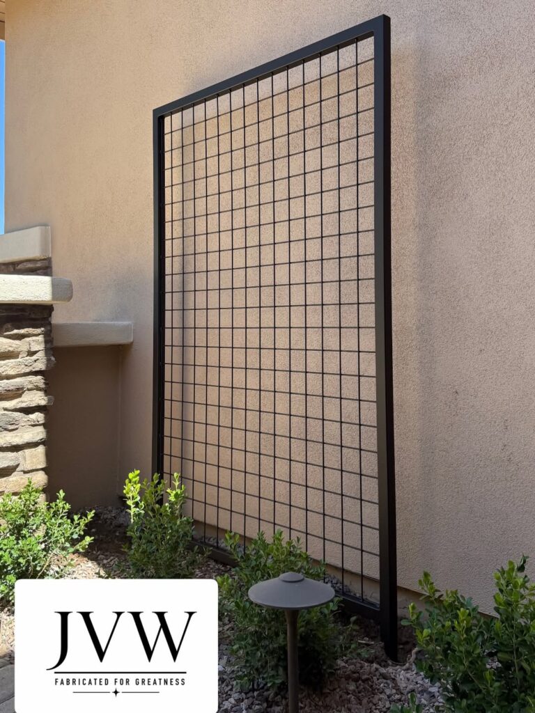 Black metal mesh fence panel